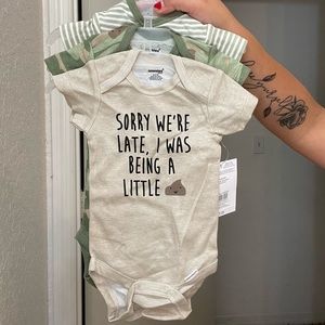 0-3 onesies, brand new with tags
